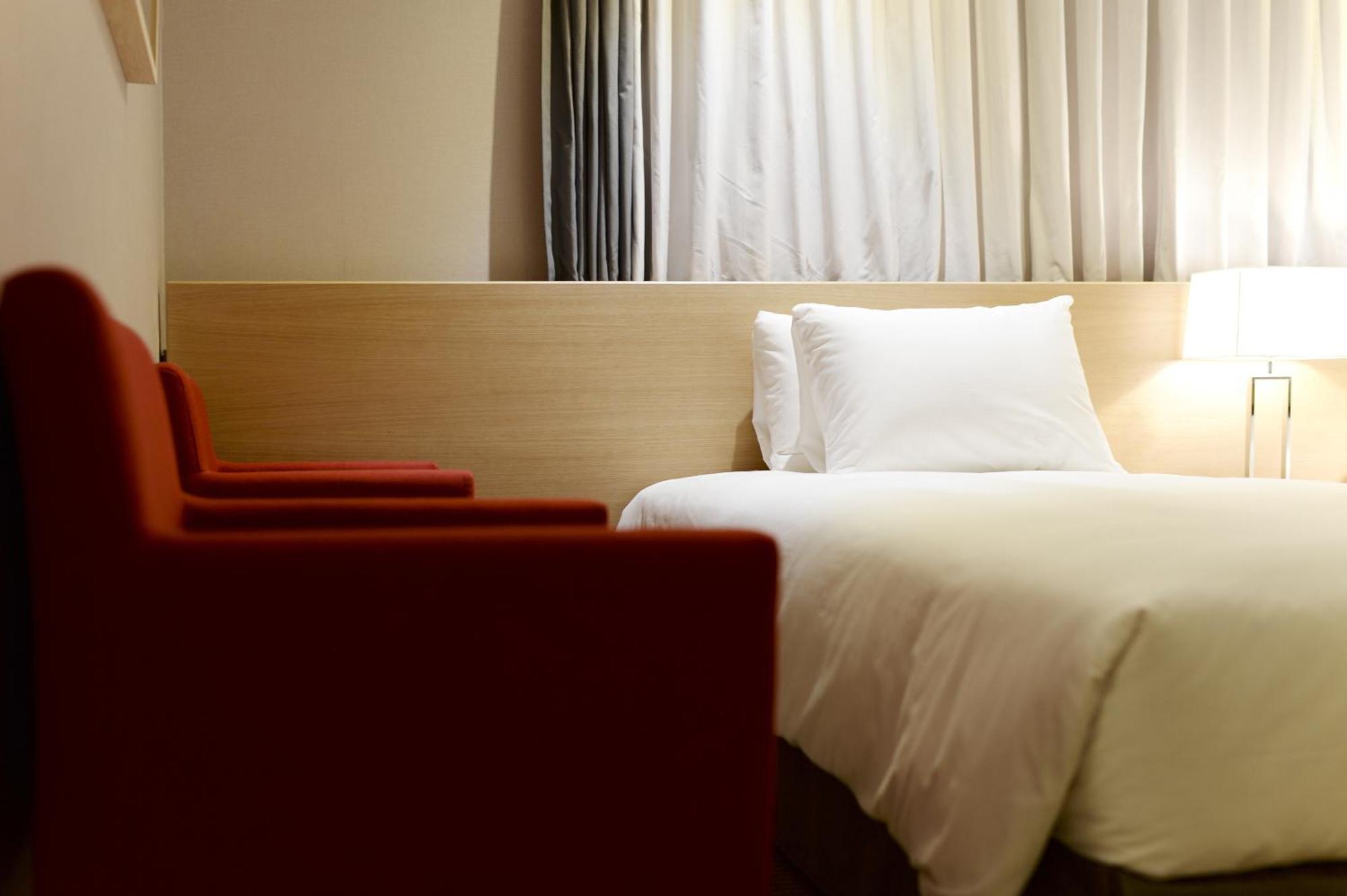 Hotel New Oriental Myeongdong Сеул Номер фото